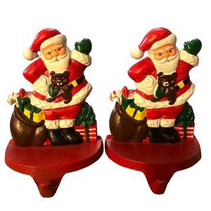 Vtg Pair of Cast Iron Santa Stocking Holders. Hand painted. Made in Taiwan.
